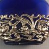 Art nouveau style perfume bottle decoration close up