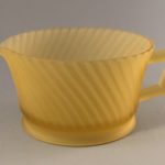 Diana depression glass creamer in frosted amber
