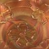 Dugan Apple Blossoms carnival glass pattern close up