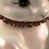 Fenton bear pink rhinestone necklace close up