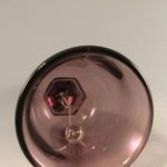 Fenton collectible amethyst glass bell inside view
