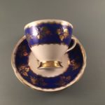 Gladstone China cobalt blue and gold tea cup and saucer side view