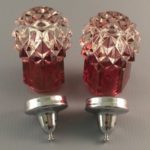 Indiana Diamond Point ruby flashed glass shakers with metal lids bottom view
