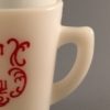 McKee Tom and Jerry milk glass mug handle