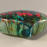 Robert Held California Poppy paperweight side view