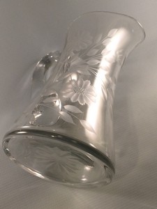 https://oldtimeglass.com/wp-content/uploads/tiffin-glass-pitcher-corn-flower-cut-side-bottom-view.jpg