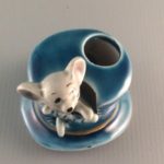 Vintage ceramic mouse in a top hat toothpick holder top view